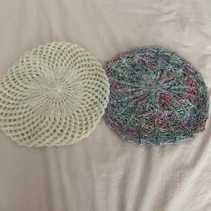 White and grey multicolored Berets.